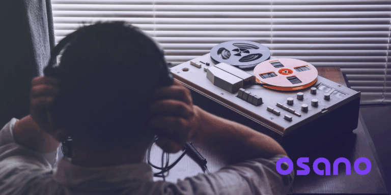 Man listening to tape recorder