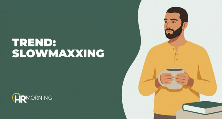 Flat illustration of a calm employee cradling a mug beside a stack of books, illustrating workplace slowmaxxing and burnout.